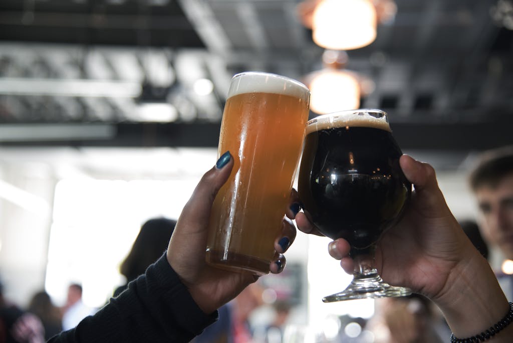 Selective Focus Photography Of People Having A Toast